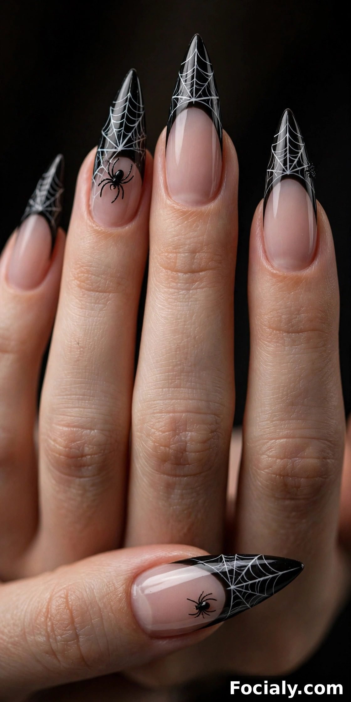 Black French tip stiletto nails with white spiderweb detailing - Halloween nails design