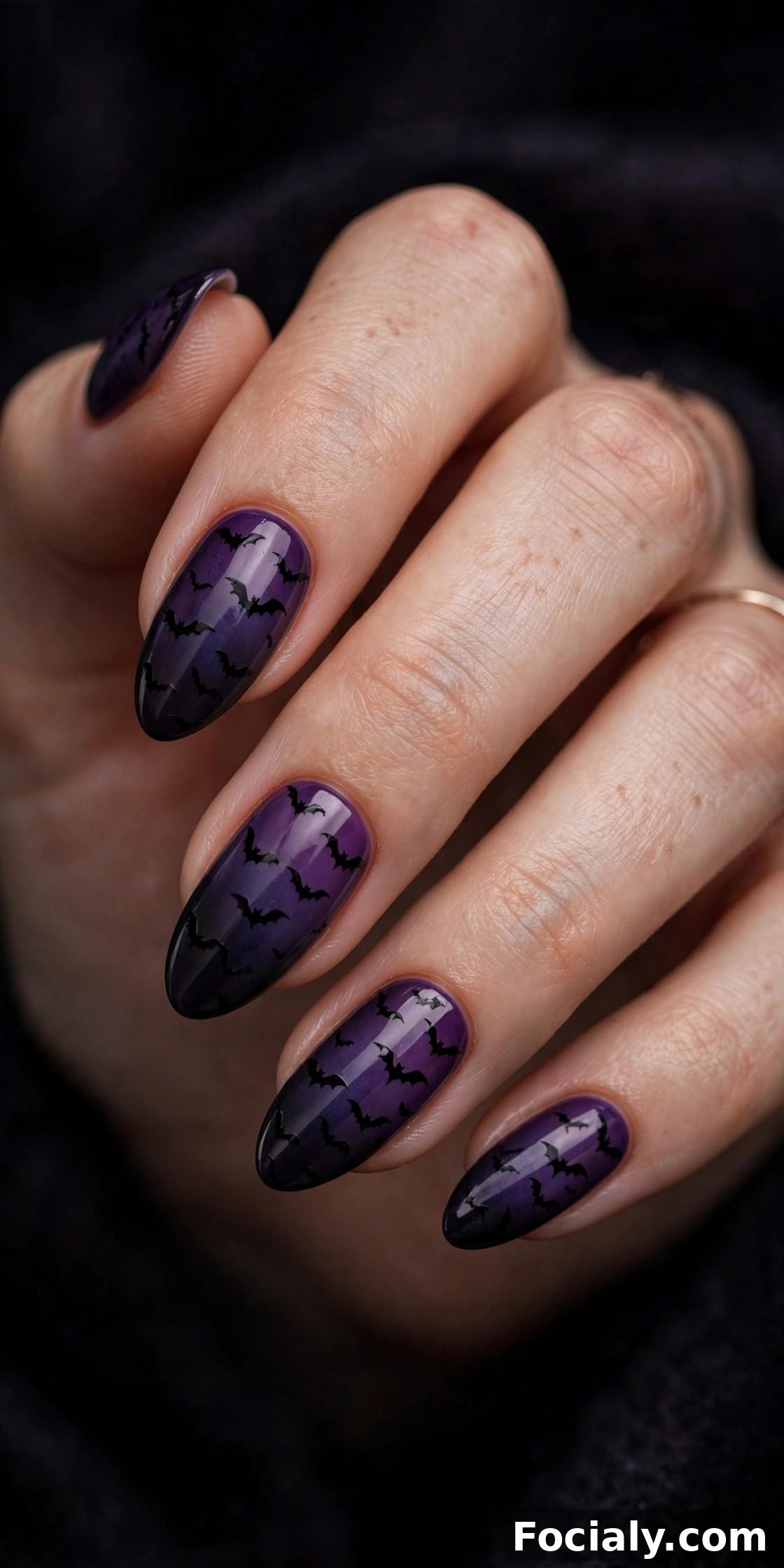 Purple to black gradient nails with flying bat silhouettes - Halloween nails design