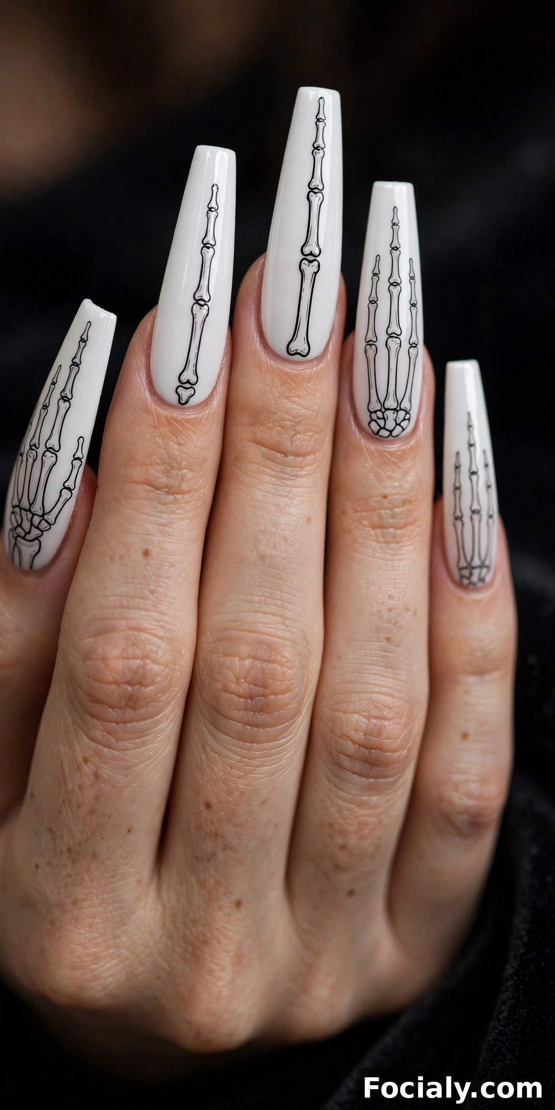 White coffin nails with black skeleton bone detailing - Halloween nails design