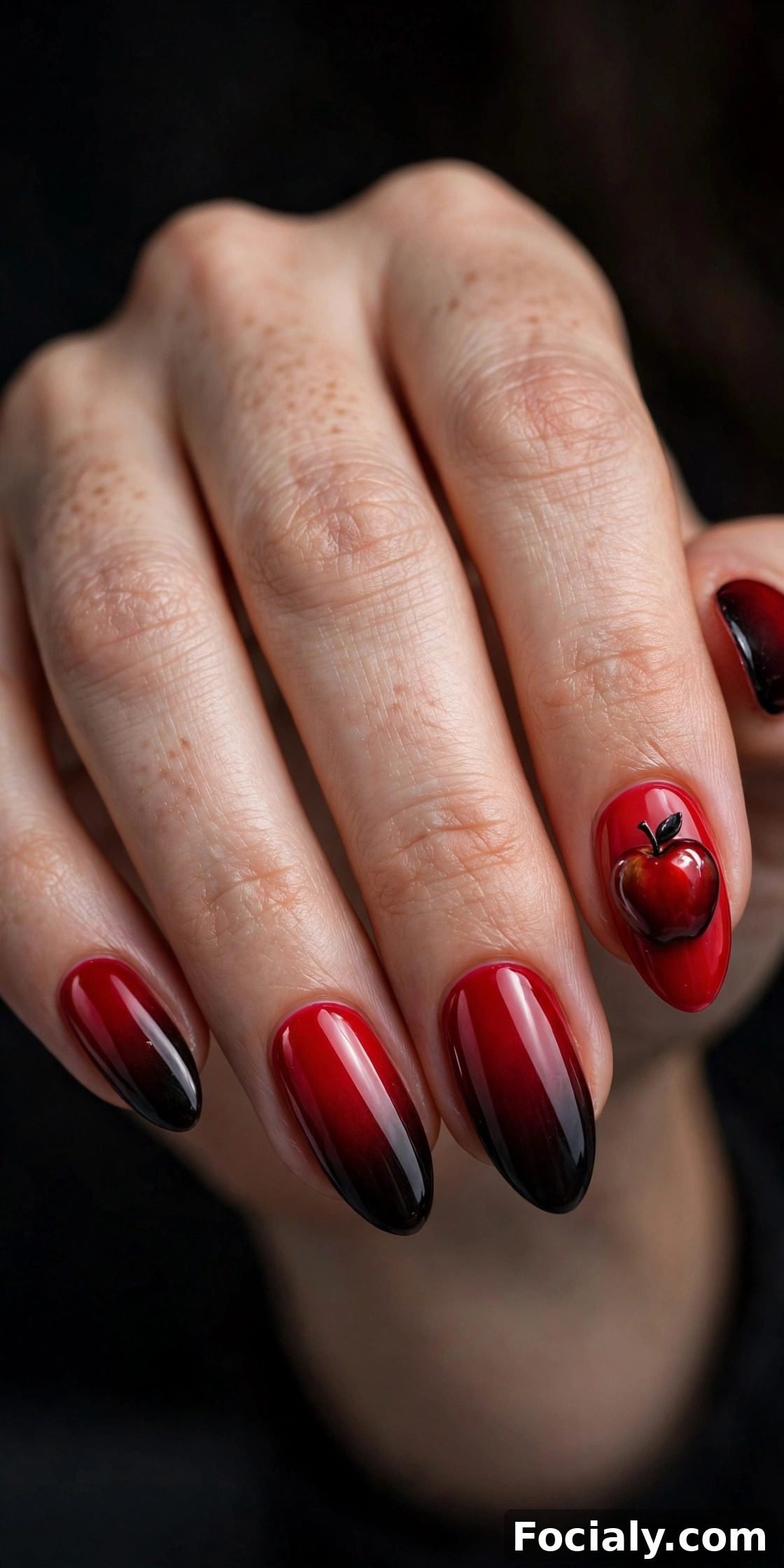 Red to black gradient nails with poison apple accent nail - Halloween nails design
